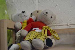 A collection of Rupert the Bear plush toys. AF