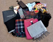 A quantity of lady's accessories to include a tartan scarf by Timberland, a pink scarf by Hobbs, a
