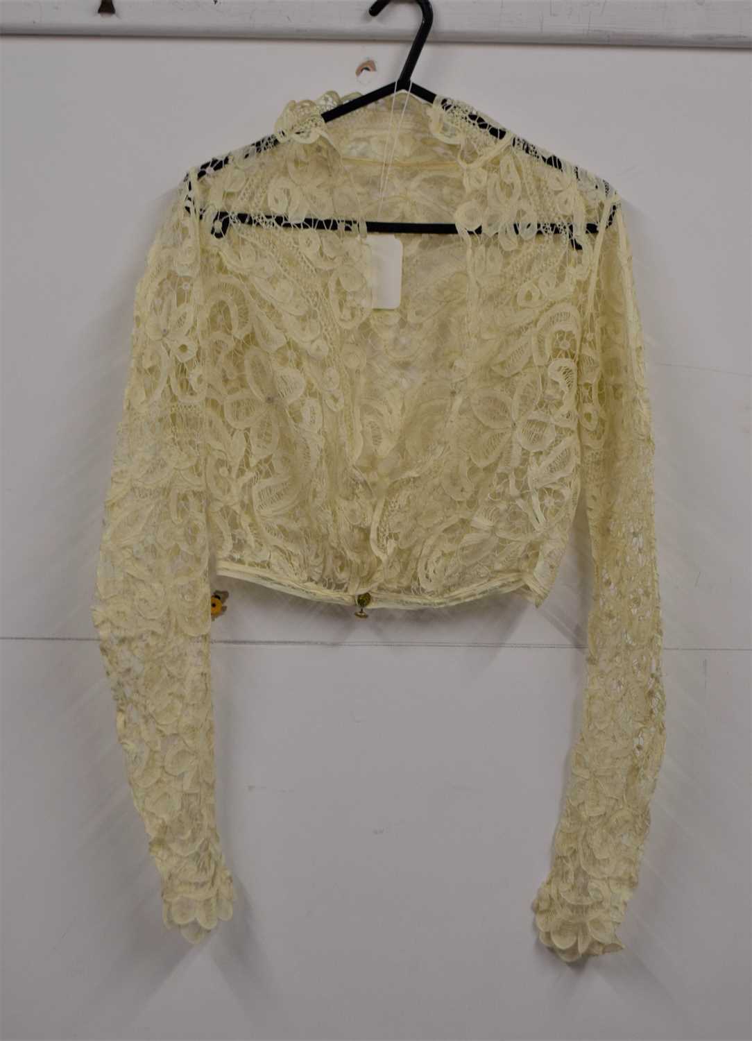 A cream bobbin lace overshirt
