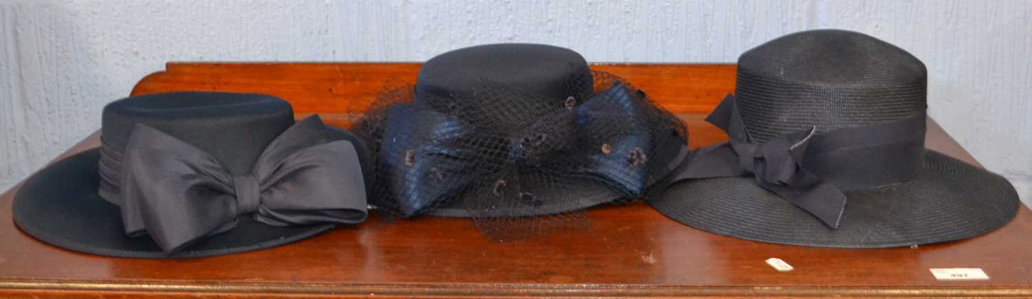 Three lady's hats to include two navy blue hats by Kangol and another by Fifth Avenue, (3)