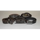 Five leather belts to include a black Armani Exchange belt, 32", a Hugo Boss black belt, 32", a