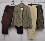 A lady's tweed jacket, a lady's tweed skirt and a pair of brown corduroy mutton leg jodpurs with