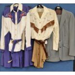 A group of American country and western clothing to include a lady's cream fringed shirt with co-