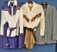 A group of American country and western clothing to include a lady's cream fringed shirt with co-