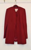 A red Nina Ricci, the 3/4 length lined fitted jacket with gilt bow buttons with asymentric cuffs,