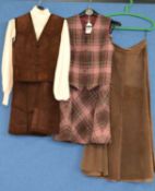 A group of c.1970/80's clothing to include a lady's purple check wool waistcoat and matching bias