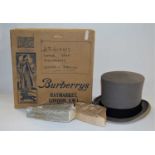 A vintage Burberry top hat (a/f) together with two ladies evening bags, (3)