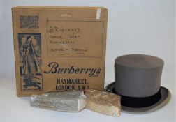 A vintage Burberry top hat (a/f) together with two ladies evening bags, (3)