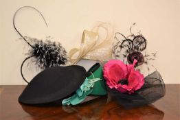 A vintage black and green wool felt hat by Peter Bettley together with four fascinators, (5)