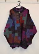 A Kaffe Fasset 'Icon' pattern hand knitted cardigan, with brown buttons