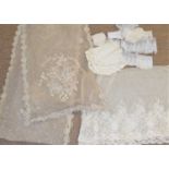 A quantity of mixed lace to include a machine net and embroidered lace shawl, approx. 320cm x