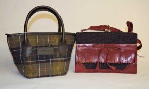 A lady's small Barbour tote bag, 29cm wide, together with a lady's Moschino bag, 25cm wide