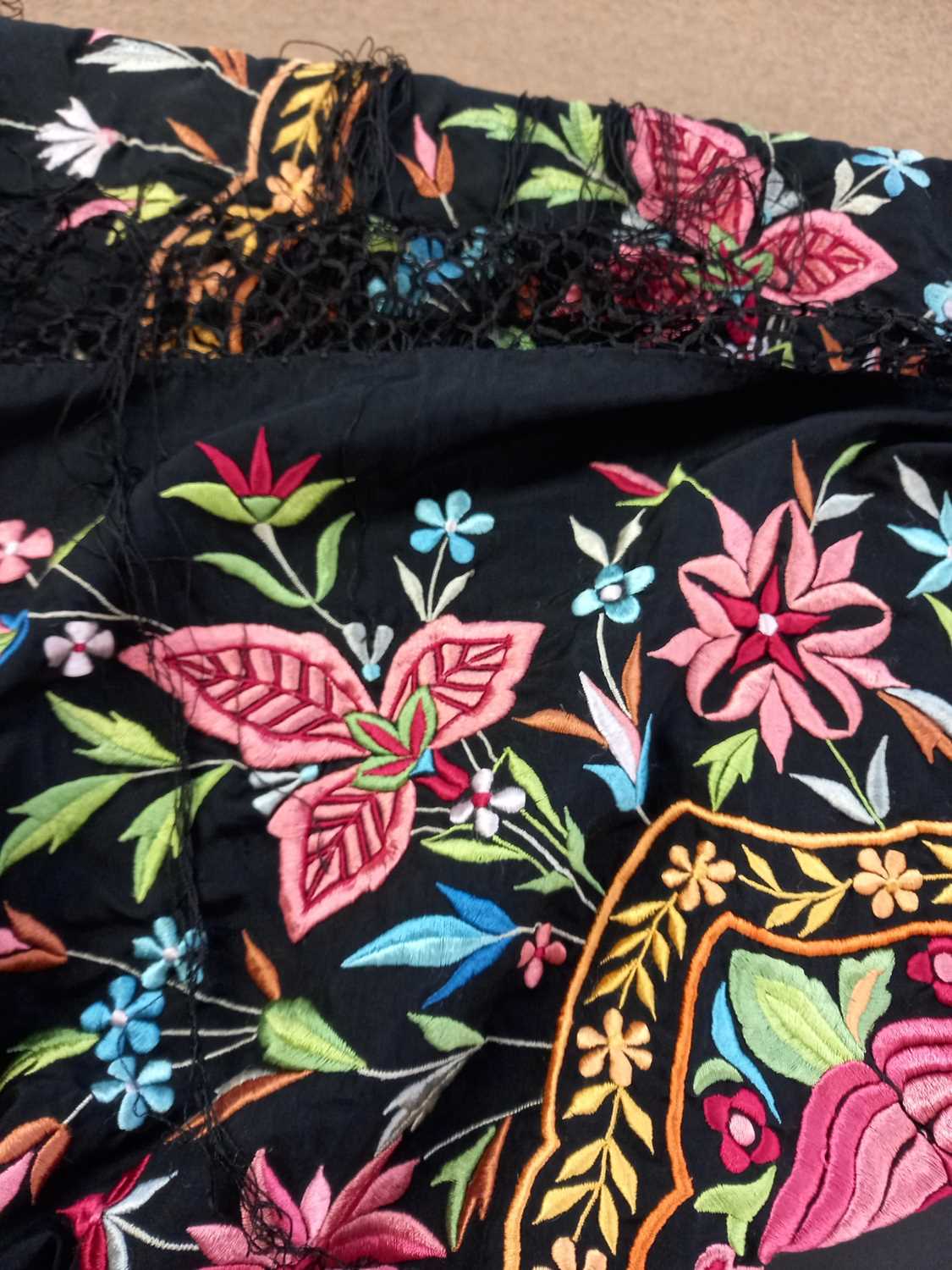 A black silk embroidered shawl, with central pink flower surrounded by floral border and further - Image 3 of 4