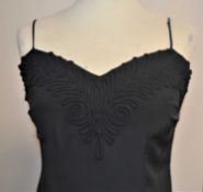 A c.1930-40's black crepe dress, shaped bustline with rouleau loop decoration, spaghetti straps