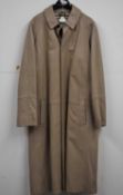 A gentleman's Burberry beige leather coat, with press stud closure and classic Burberry check