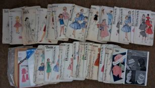 A quantity of mid 20th century childrens and adult sewing patterns, (qty)
