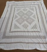 A white cotton drawn thread work tablecloth, approx. 195 x 225cm, together with 6 cutwork napkins