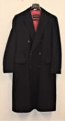 A gentlemans coat by Yves Saint Laurent, the navy blue double breast coat, approx. 44" chest