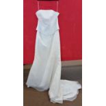 A cream satin wedding gown, with strapless beaded bodice and mesh overlay, with train, size 18