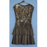 A c.1980's/90's black sequin and ruffled cocktail dress by John Charles, size 14, together with a