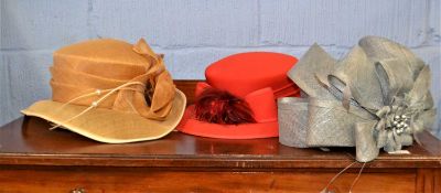 Three lady's hats to include a beige straw hat by Laura McClelland, new with tag, a grey folded