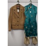 A lady's brown suede jacket with double button and patch pockets, size 16, together with a pair of