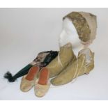 A pair of lady's Victorian shoes, in green silk with blue stiching and cream side laces, leather