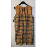 A Burberry's check wool coat liner, sleeveless with all around zip UnisexMeasures approx. 50"