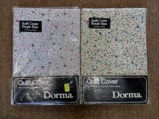 Two Dorma floral pattern single size quilt covers, c.1970's, in original packaging, (2)