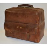 A brown leather dressing bag by Alexander Clark, 188, Oxford Street London, with hinged opening