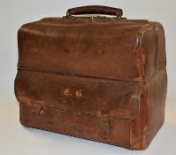A brown leather dressing bag by Alexander Clark, 188, Oxford Street London, with hinged opening