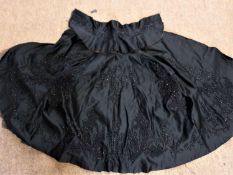 A Victorian black beaded mourning cape with stand up collar, (a/f), together with a small black lace