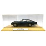A cased Danbury Mint die-cast 1964 Aston Martin DB5, as seen in James Bond - Goldfinger.Limited
