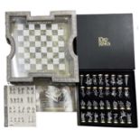 A Collector's Edition Lord of the Rings chess set by Noble, with highly detailed raised board and