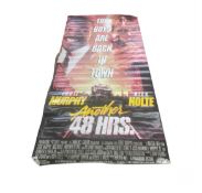 A large advertising banner for Another 48 Hrs, starring Eddie Murphy and Nick Nolte.Size