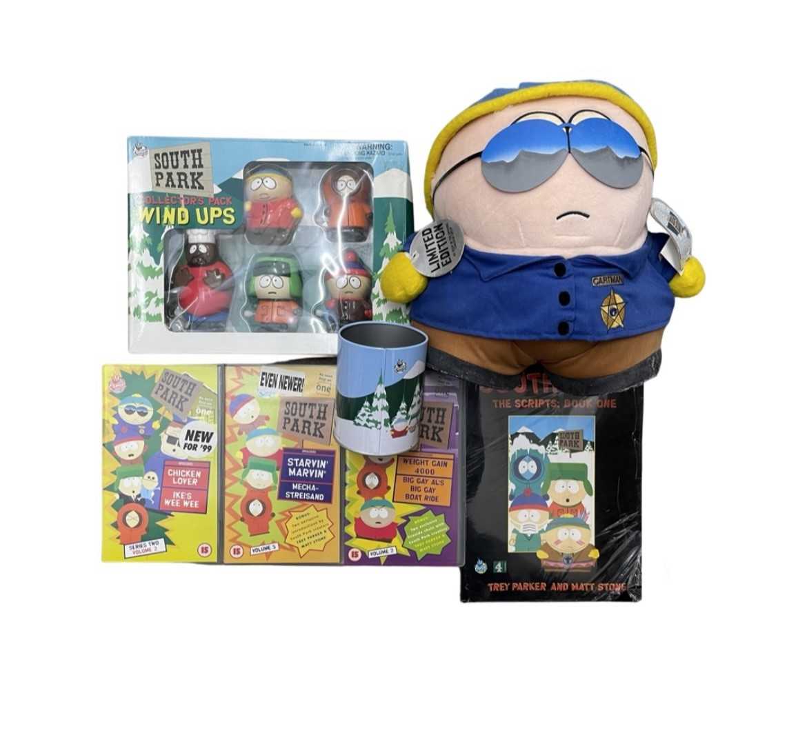 A collection of official South Park memorabilia, to include: - Limited Edition Officer Cartman plush