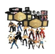 A collection of NWO Wrestling figures, belts, trading cards etc