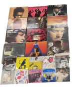 A mixed lot of 12" vinyl LPs and some singles: classic pop and rock, to include: - Tracy Chapman: