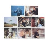 A collection of United Artists colour 8x10'' stills featuring Roger Moore as James Bond in Live