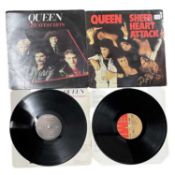 A pair of Queen 12" vinyl LPs, to include: - Sheer heart Attack, 1974, EMC 3061 - Greatest Hits,