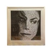 A large framed and glazed photo-mosaic print portrait depicting Michael Jackson.Framed size