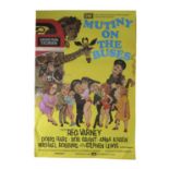 An original British one sheet poster for Mutiny on the Buses (1972) from the Studio Canal Archive at