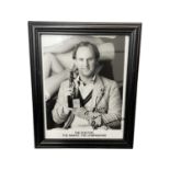 A framed 8x10" black and white photograph, bearing the signature of The Fifth Doctor, Pete