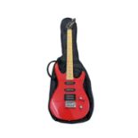 A 1980s 6-string Washburn G-JR-V electric guitar in red. Repair to side of body, some minor paint