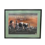 A Stargate SG-1 poster, 'The Journey Continues...', bearing the signatures of several cast members