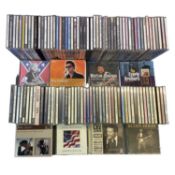 A mixed lot of CDs from rock/country artists to include: - Bob Dylan- Buddy Holly - Roy Orbison -