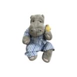A promotional plush hippopotamus in pyjamas with chick for Silent Night mattresses.Length