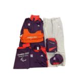 A collection of London Paralympics/Olympics 2012 gamesmakers uniform, to include: - 2 x pairs of