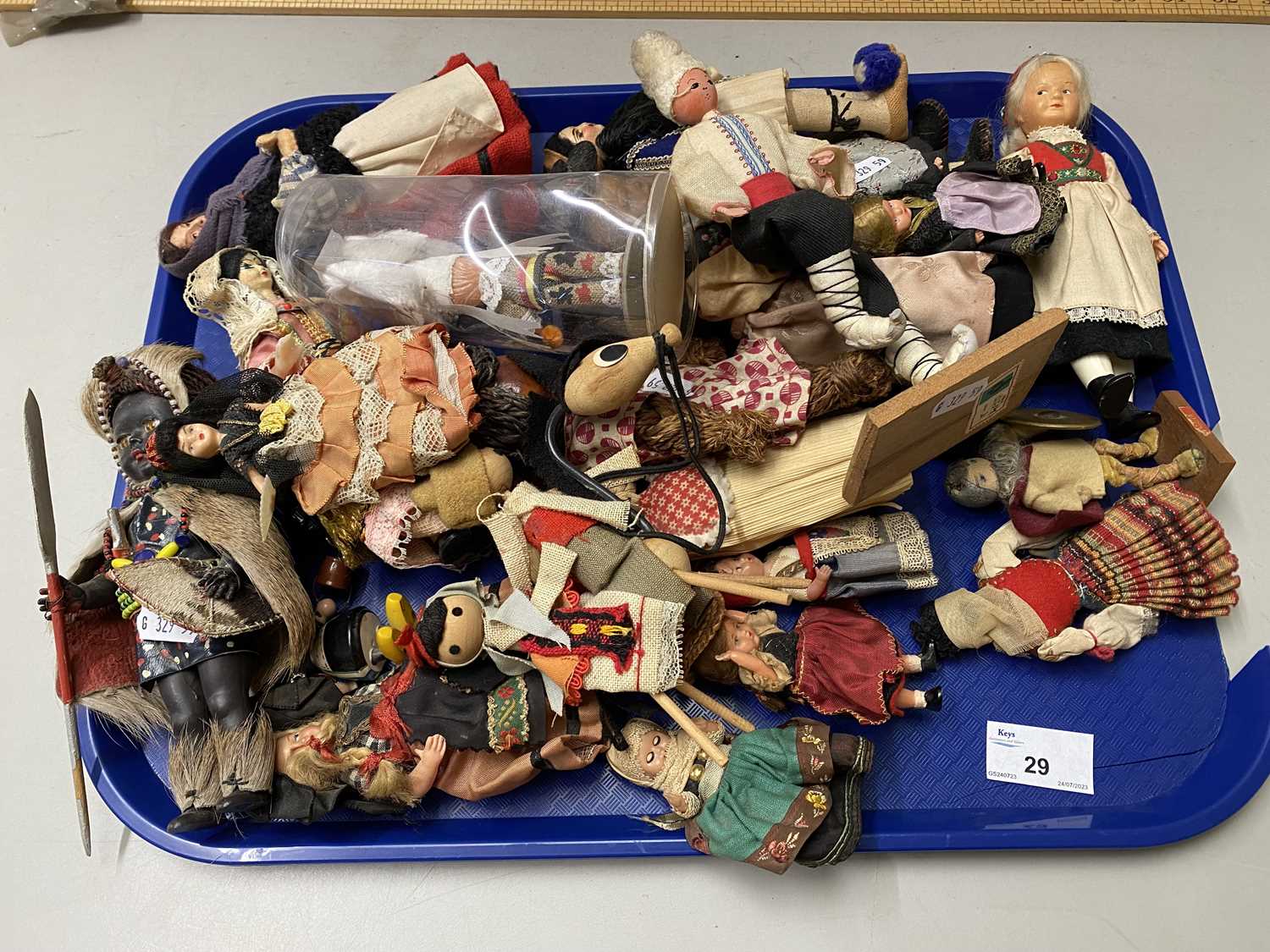 Collection of various tourist costume dolls