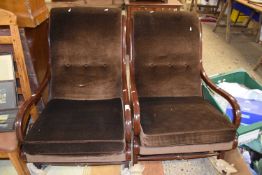 Pair of 20th Century upholstered rocking chairs